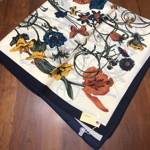 Silk scarf, 27” sq, classy with colors of cream, black, green, orange, gold.